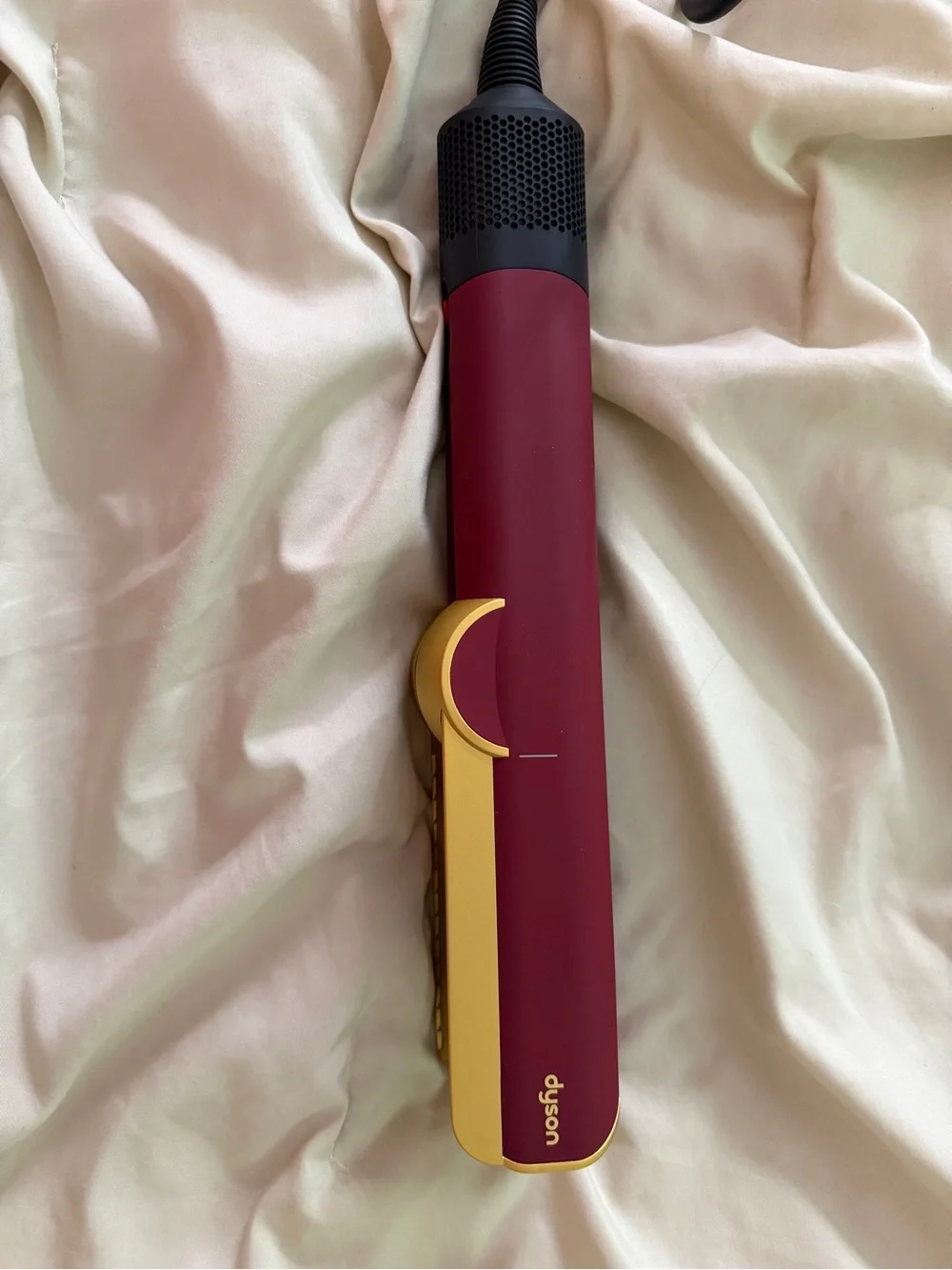 Dyson burgundy and gold hair straightener